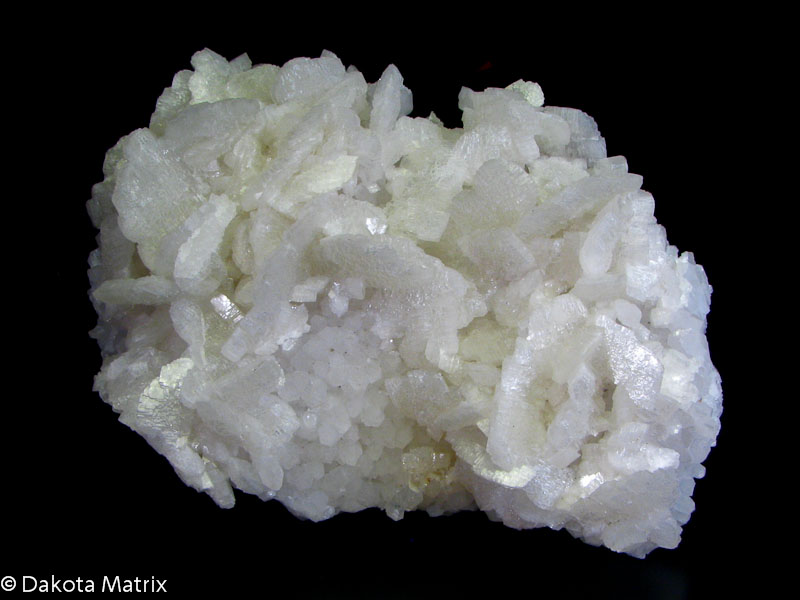 Dolomite - Large specimen with thick tabular white, glossy crystals to 2cm. . This and many more mineral specimens are available for sale at Dakota Matrix Minerals.