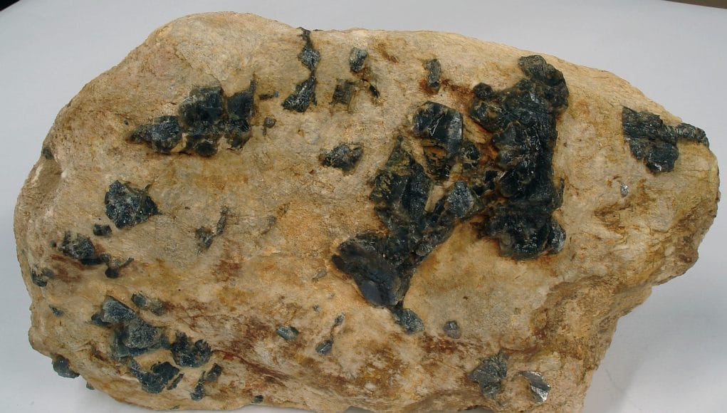 Alkaline Pegmatite Rock have large crystal size minerals in it.