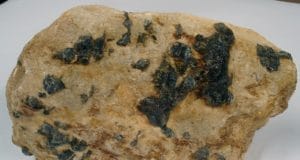 Alkaline Pegmatite Rock have large crystal size minerals in it.