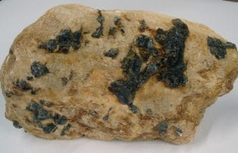 Alkaline Pegmatite Rock have large crystal size minerals in it.