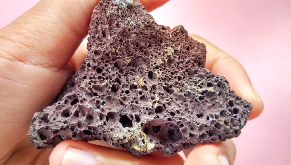 Close-up of pumice stone showing its highly porous volcanic texture
