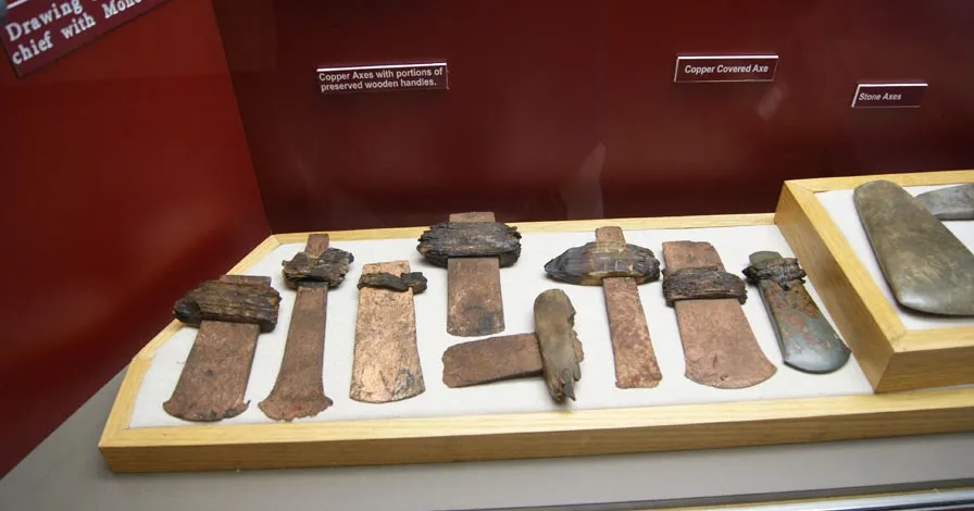 Early copper tools symbolizing the dawn of metallurgy.