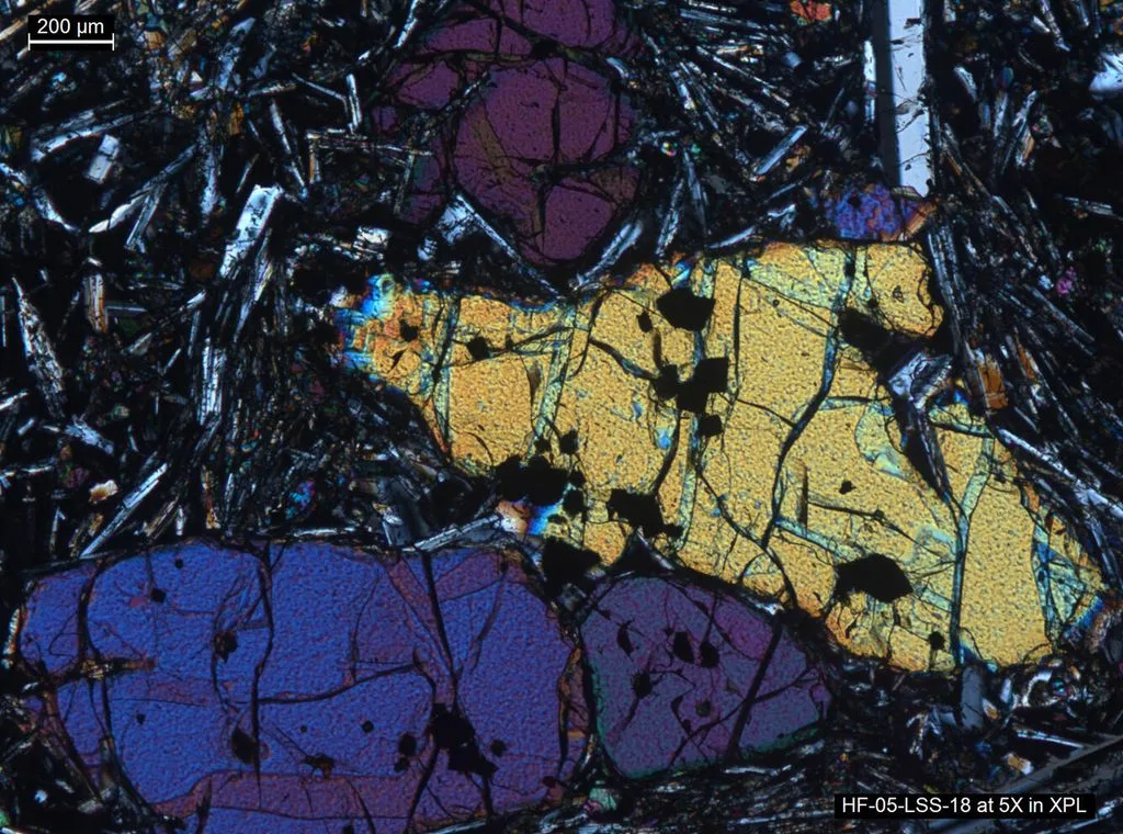 Olivine crystals in basaltic lava showing minerals crystallized from cooling magma